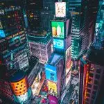 Stand under the glowing lights, hustle and bustle of Times Square